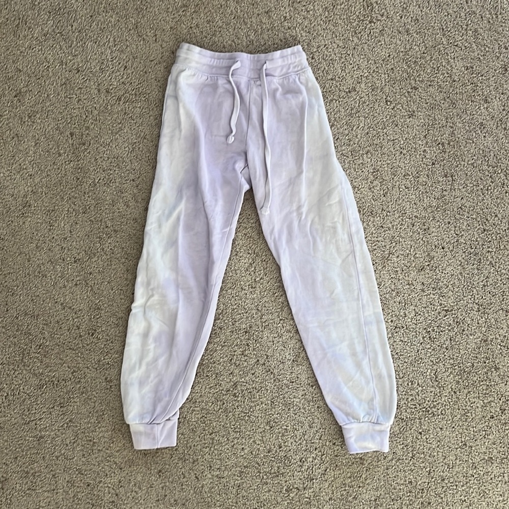 Girls purple and white sweat pants. Size: L.